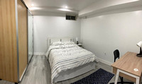 Replin Co-Living House lower level private bedroom with private bathroom